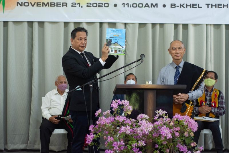 Rev Kenilevi releasing the 75th Anniversary Seweda (Souvenir) during the Kuda Village, B-Khel 75th year of establishment celebration on November 21.